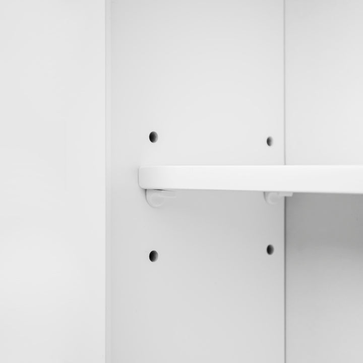 Close-up of the adjustable shelf inside the cabinet