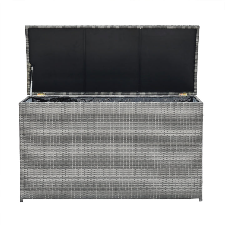Teamson Home Gray PE Rattan 154-Gallon Outdoor Deck Box with the lid open and the interior lining visible