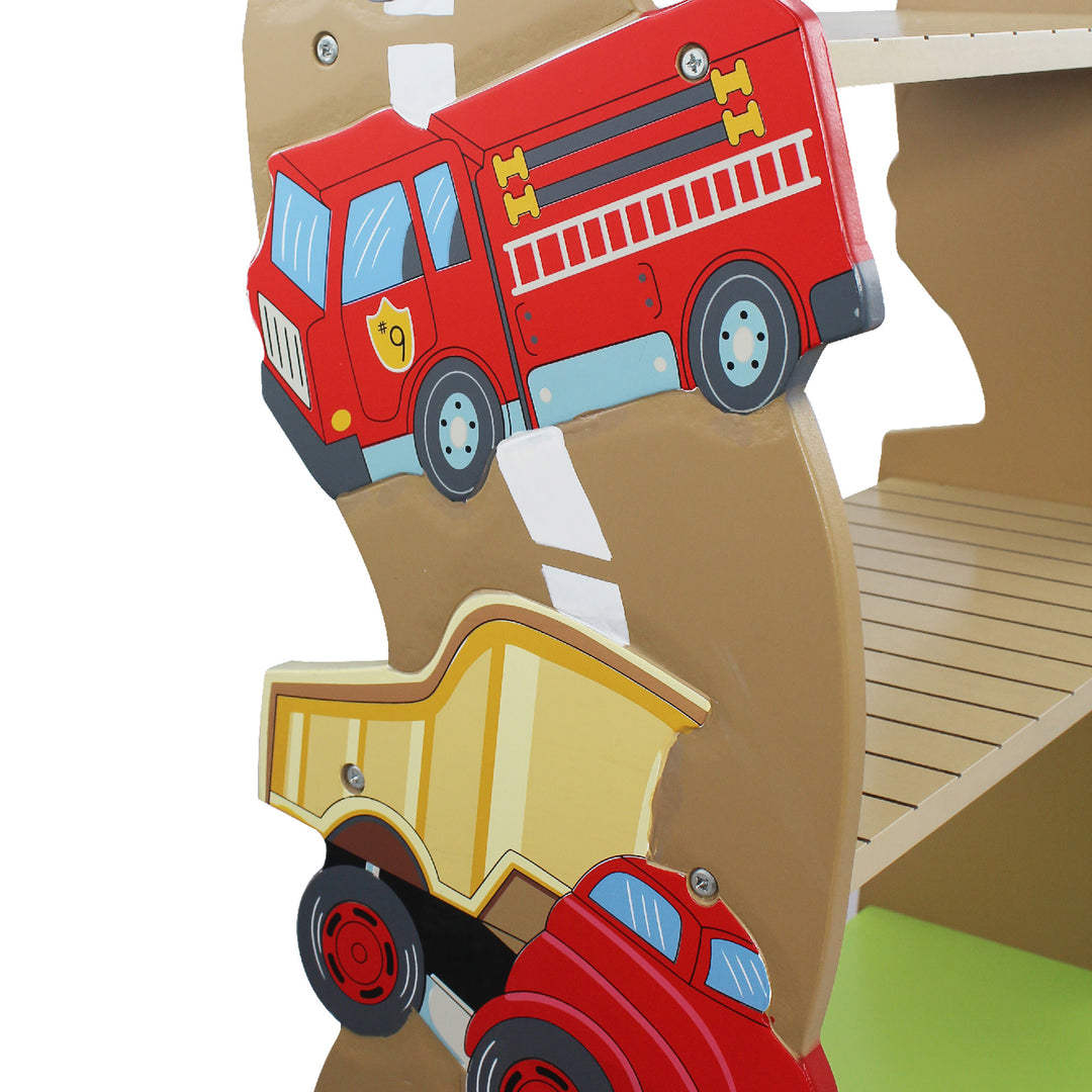 A closeup of a truck and a dump truck on the side of the bookshelf.