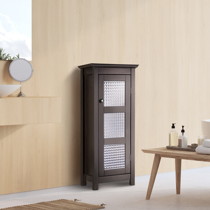 A Teamson Home Chesterfield Wooden Floor Cabinet with Waffle Glass Door in a spa-like bathroom setting