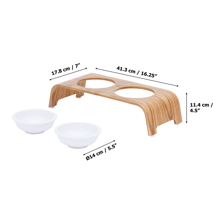 Billie Small Elevated Ash Wood Pet Feeder with white ceramic bowls and a wood grain finish with the dimensions in inches and centimeters.