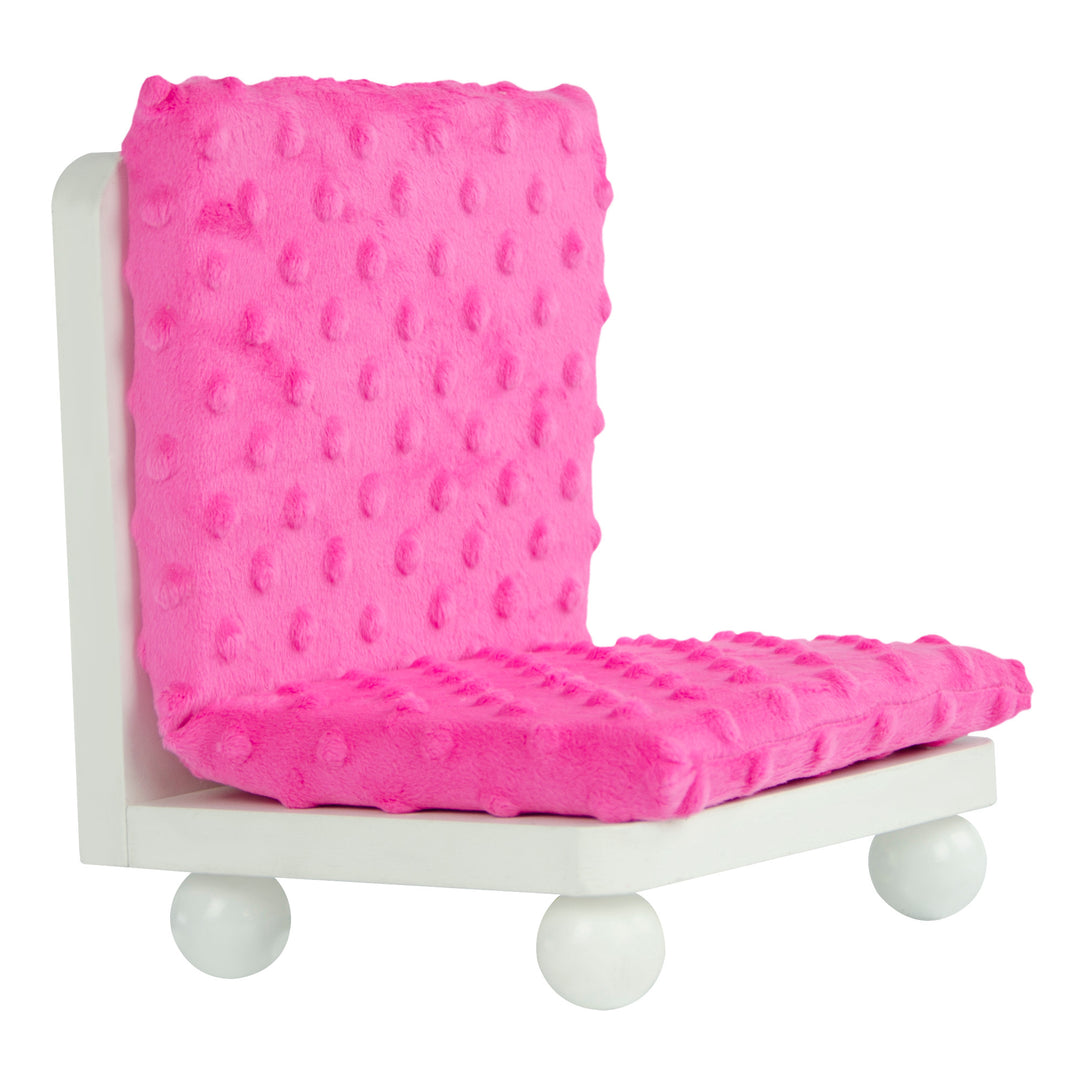 A Olivia's Little World Little Princess Lounge Set cushioned chair on a wooden base with assembly instructions.