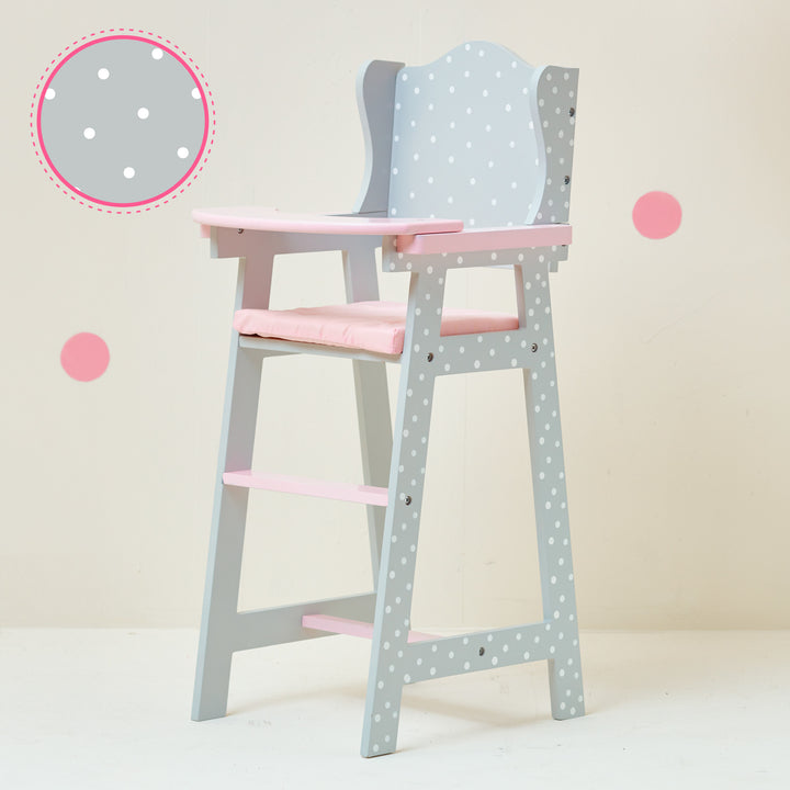 Close-up of the gray with white polka dot finish next to the full high chair.