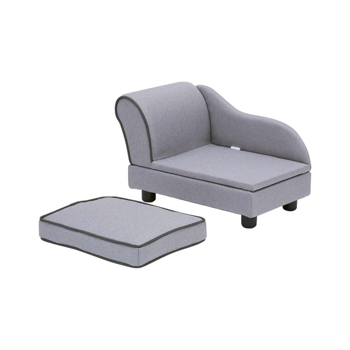A small gray chaise lounge pet bed for cats or small dogs with the cushion removed and next to the frame.