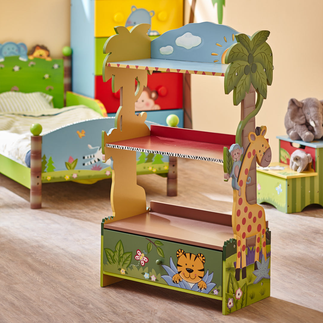 A Safari-themed children's room with giraffes and zebras, featuring a Fantasy Fields Kids Painted Wooden Sunny Safari Bookshelf with Storage Drawer for storage.