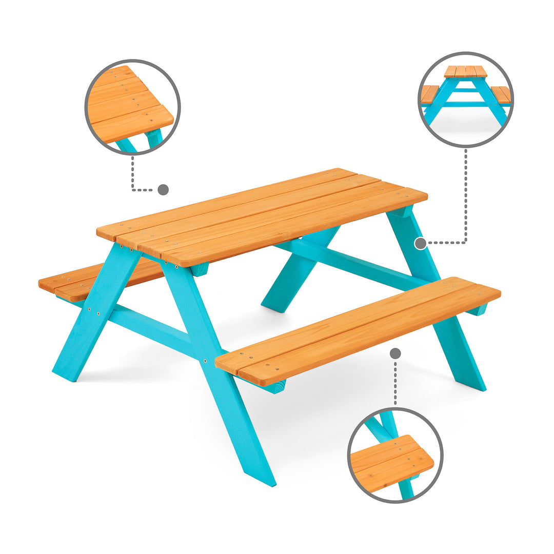 Teamson Kids Child Sized Wooden Outdoor Picnic Table, Warm Honey/Aqua with versatile blue supports and detailed insets showing the table's corner and surface textures.