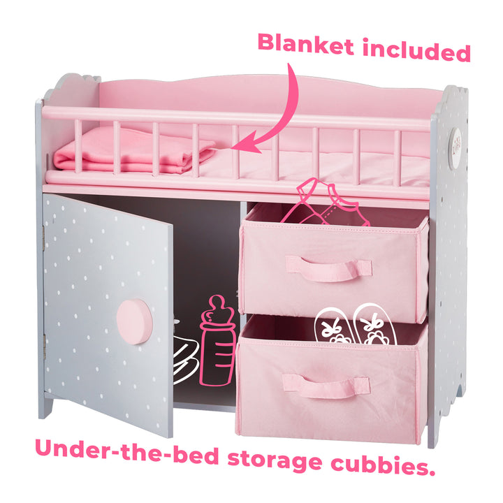 A close up of the bedding and the open cabinet and storage cubbies with the captions "Blanket included", "Under the bed storage cubbies."