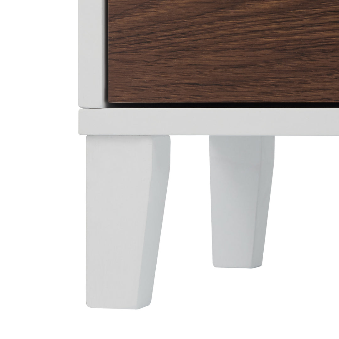 Close-up of the cabinet feet on the Teamson Home Tyler Modern Linen Storage Cabinet with Two Doors, Walnut/White