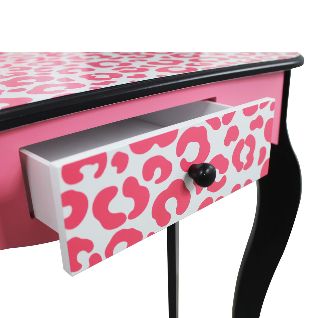 A Fantasy Fields Gisele Leopard Print Vanity Playset, Pink / Black desk with a leopard print drawer.