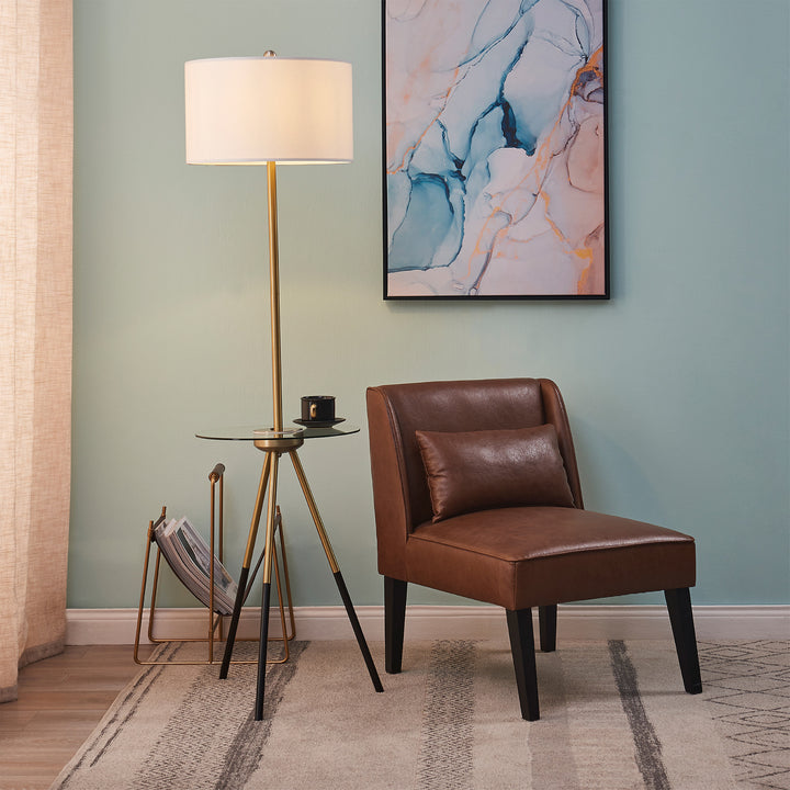A living room with a brown chair and Teamson Home Myra Floor Lamp with Table, Gold/White Shade