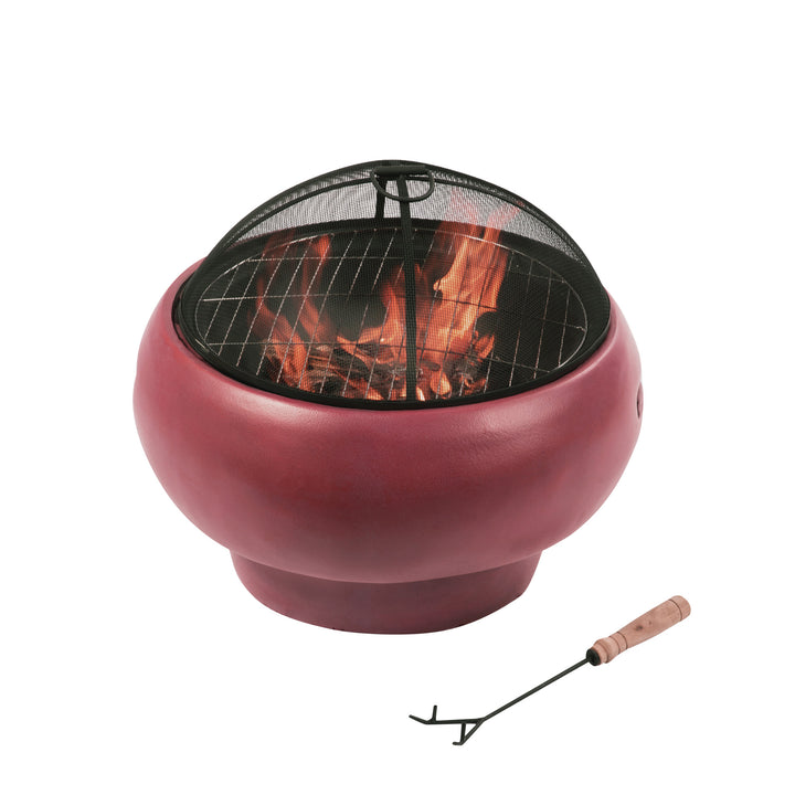 Teamson Home Outdoor 21" Wood Burning Fire Pit with Grill Grate and Faux Concrete Base, Maroon, with a fire inside underneath the spark screen