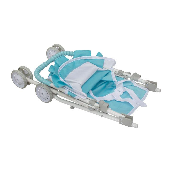 A blue and white baby doll stroller in its collapsed position for easy storage.