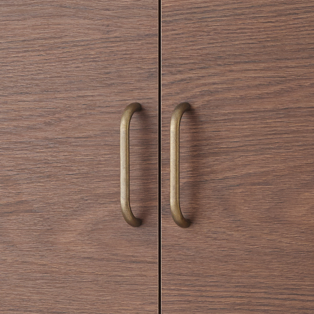 Close-up of the brass pull handles