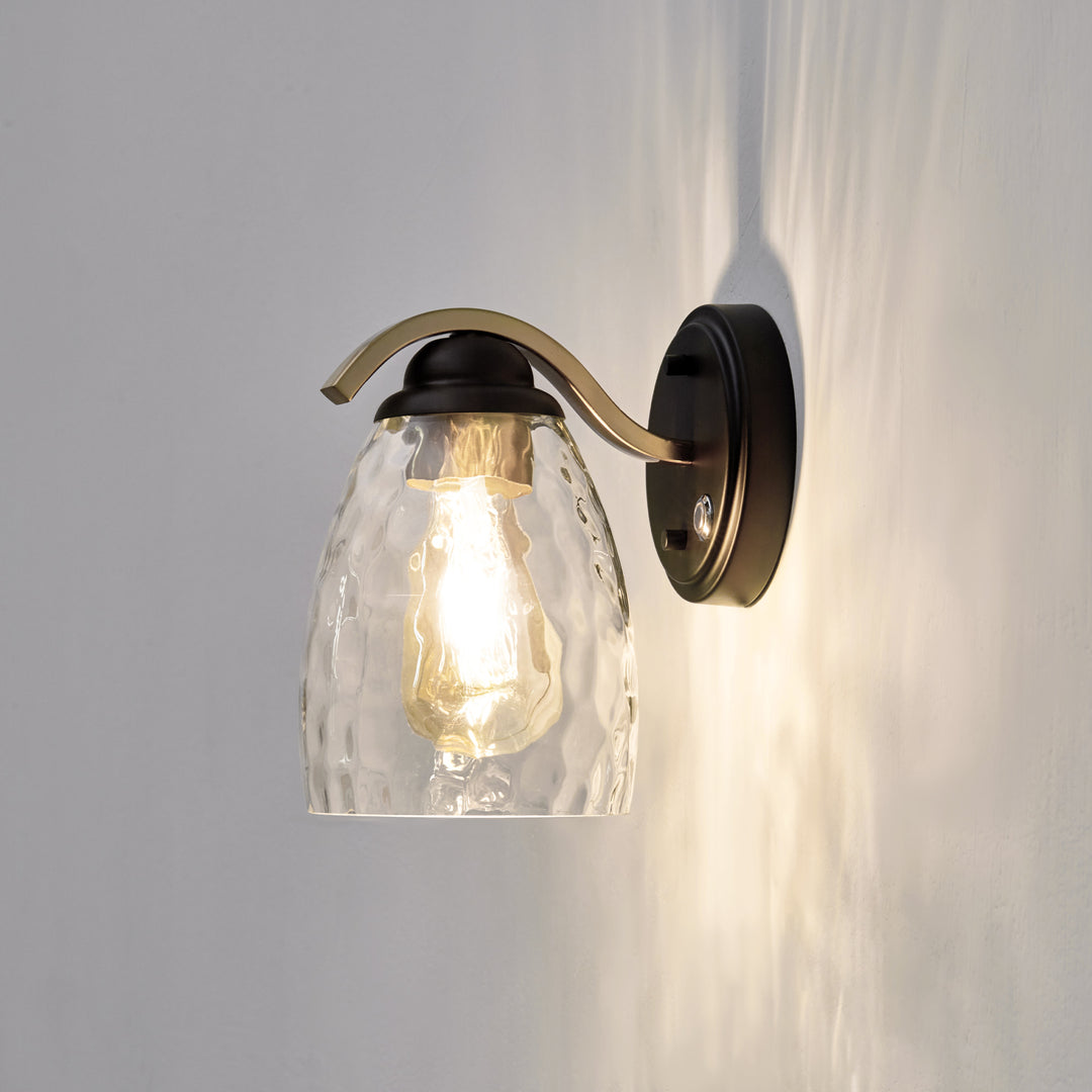 View from the side Teamson Home Heidi Wall Sconce with Clear Hammered Glass Cloche Shade, Black/Brass