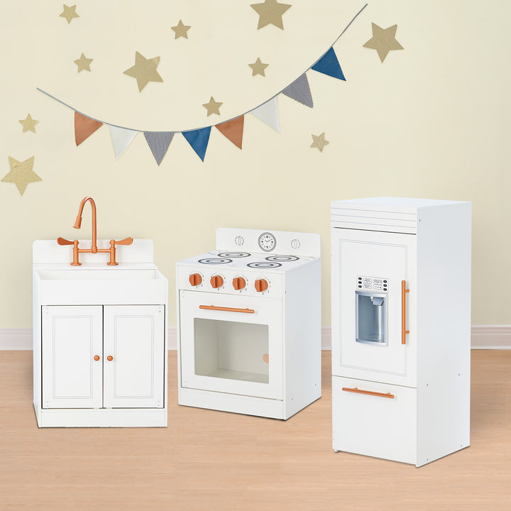 Children's Teamson Kids Little Chef Paris Complete Kitchen Playset in a room with decorative star garlands, featuring modern design and realistic details.