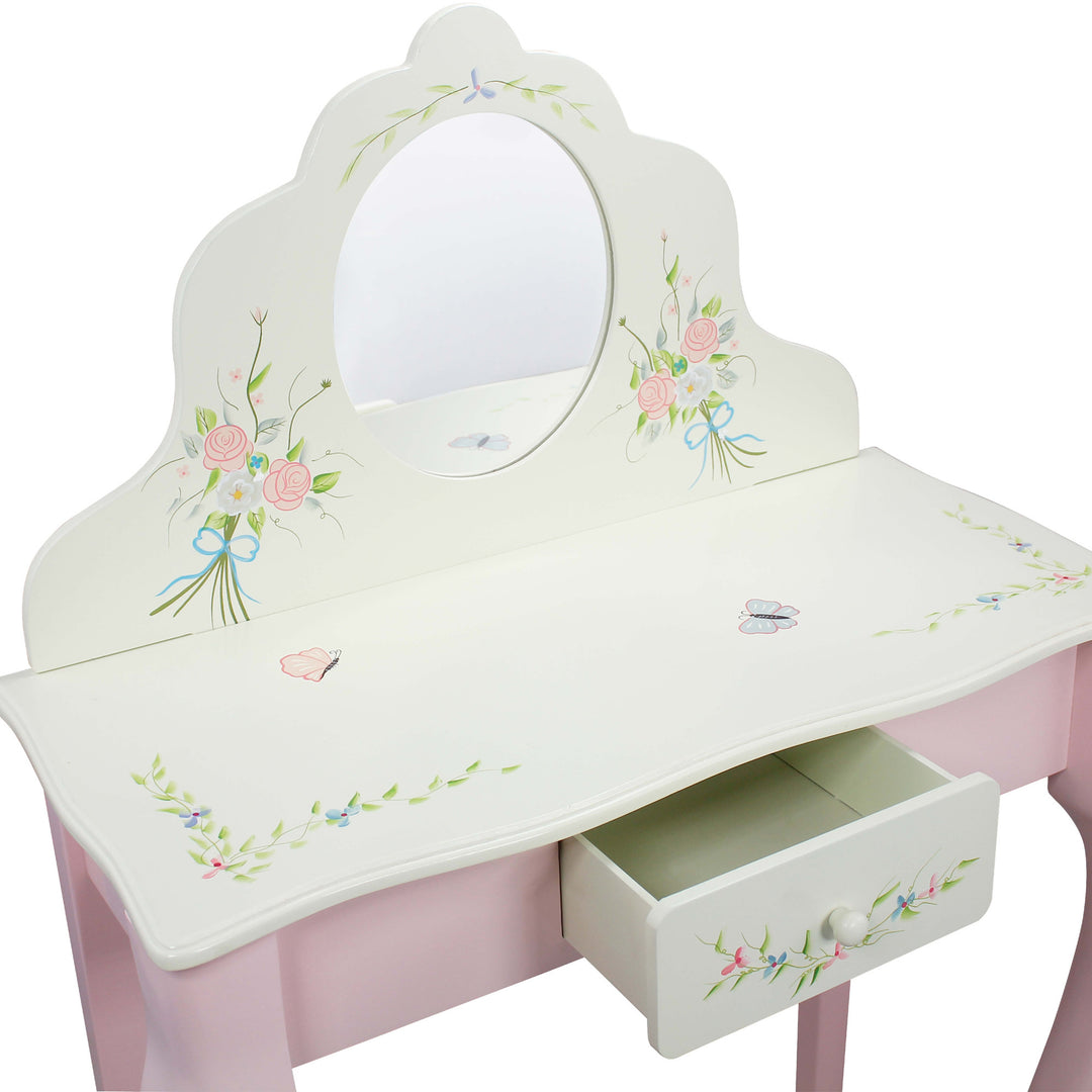 A Fantasy Fields Kids Furniture Play Vanity Table and Stool, Pink/White with a mirror and drawers.