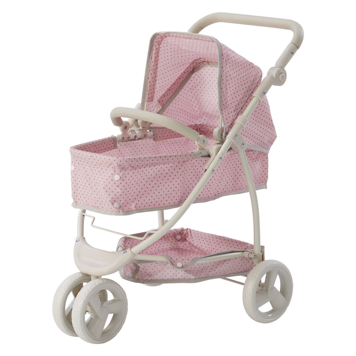 A pink and white foldable Olivia's Little World Polka Dots Princess 2-in-1 Baby Doll stroller with adjustable handle and wheels.