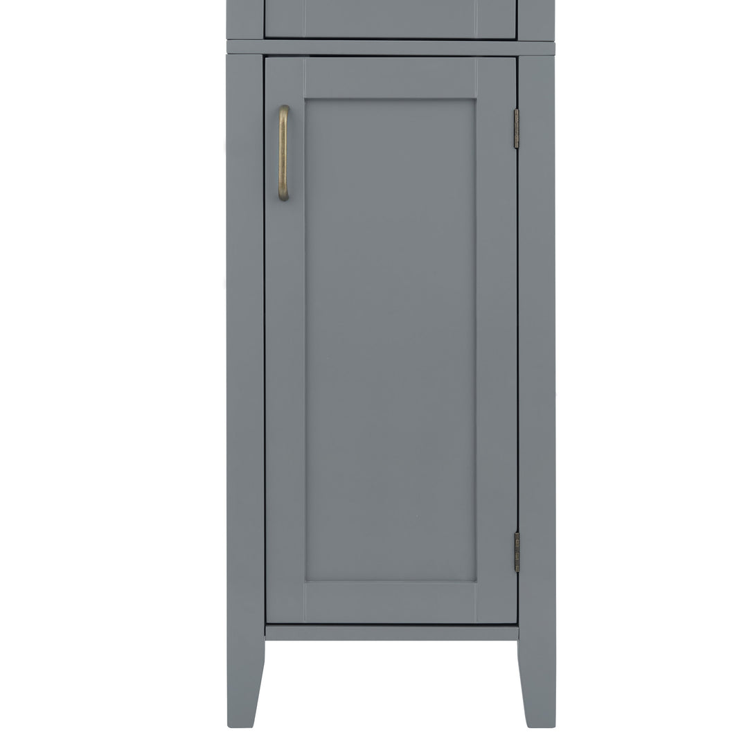 Close-up of the bottom cabinet on the Teamson Home Mercer Mid Century Modern Linen Tower Storage Cabinet with Two Doors, Gray