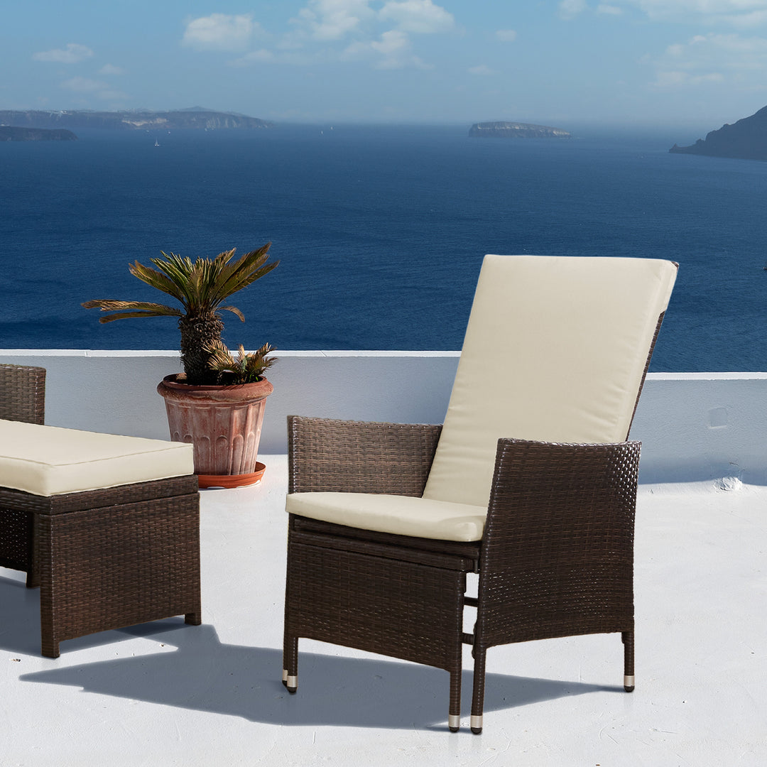 Teamson Home Outdoor PE Rattan Patio Chair with Ottoman and Cushions, Brown/White on a beautiful balcony.