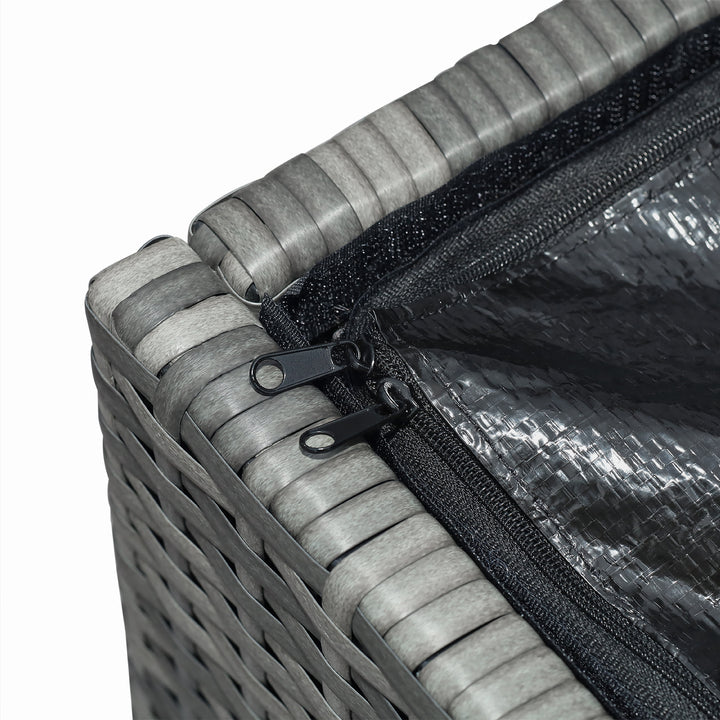 Close-up of a Teamson Home Gray PE Rattan 154 Gallon Outdoor  close-up of the zipper on the protective lining and the PE rattan weave