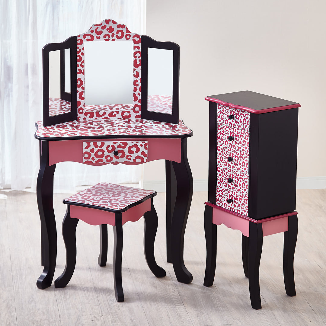 A pink and black Fantasy Fields Gisele Leopard Print Vanity Playset with a mirror and stool and a jewelry tower.