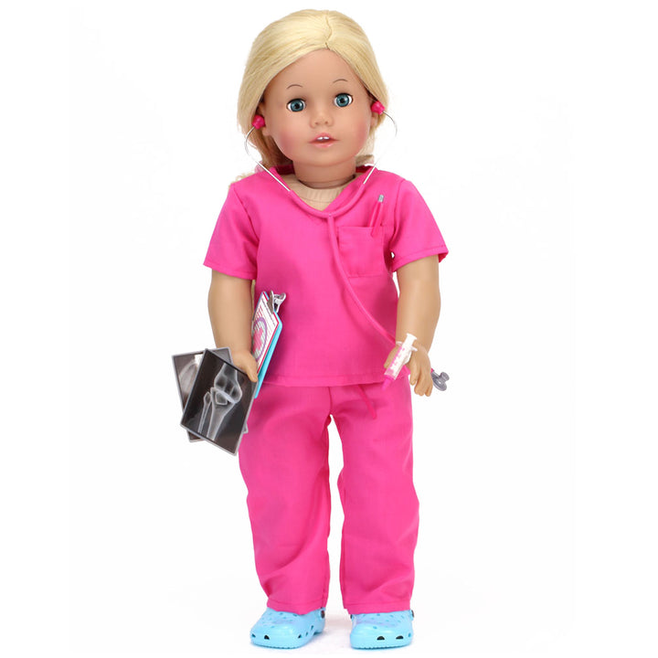 A 18" blonde doll with blue eyes wearing pink scrubs and comfy blue shoes with a stethoscope around her neck, a syringe in one hand and xrays and a clipboard in the other.