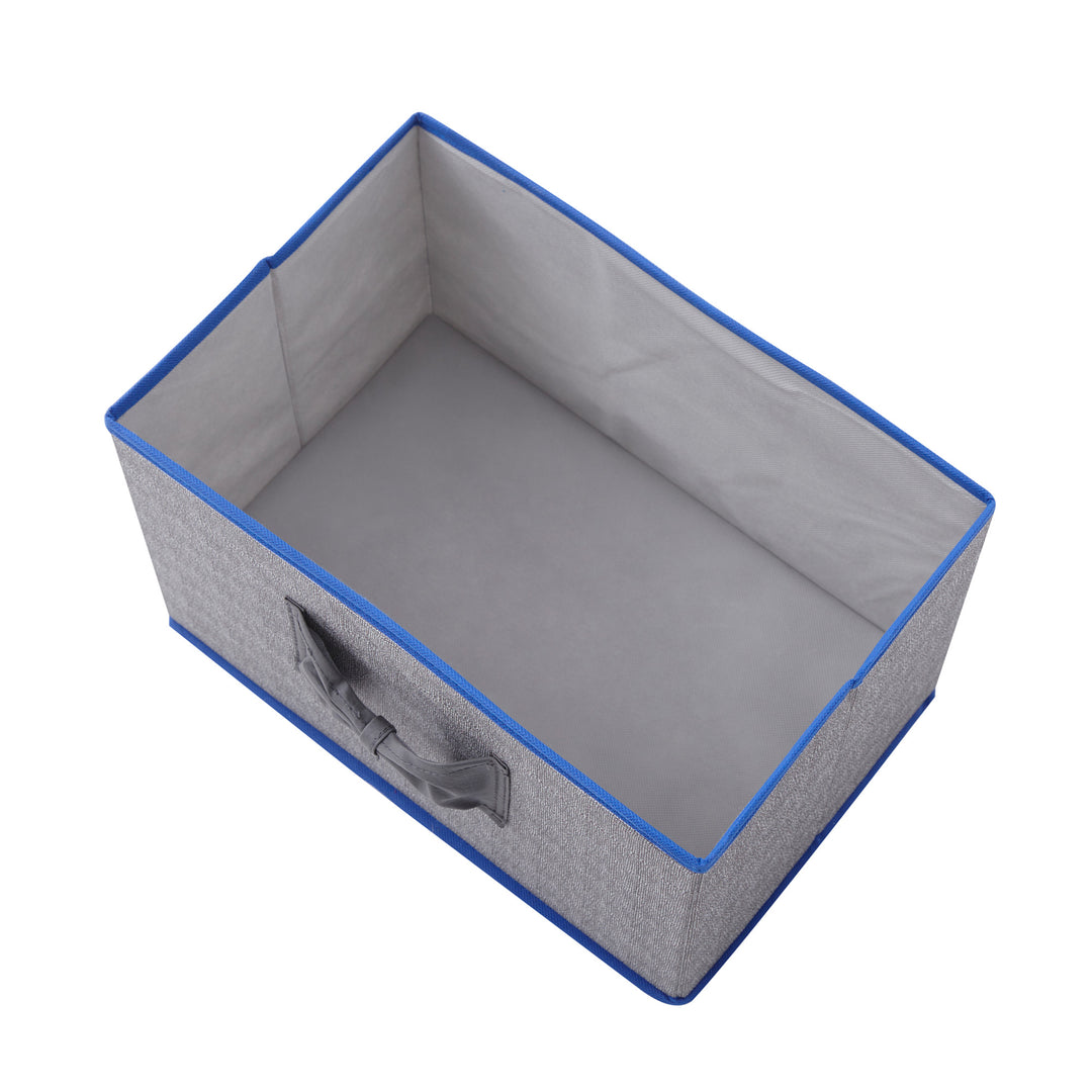 A view of the inside of a Teamson Home Fabric Storage Cubes with Lids, Gray with Blue Trim
