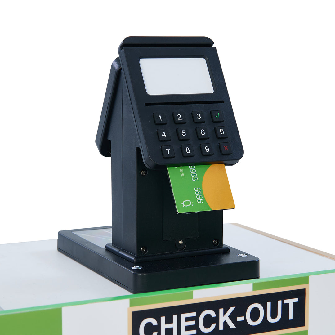Teamson Kids Cashier Austin Play Market Checkout Counter with 26 Accessories, Green/Natural with a credit card inserted at a market stand checkout counter.