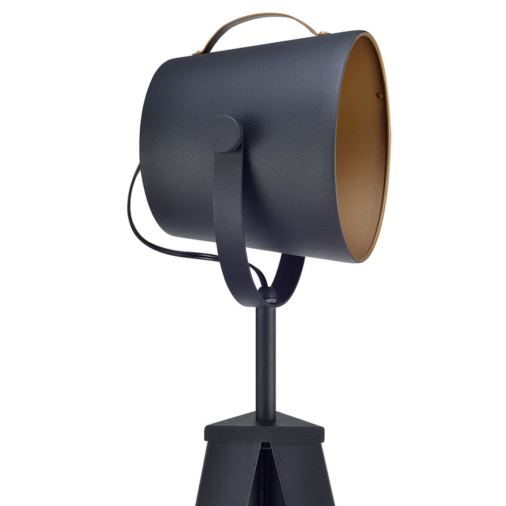 Close-up of the lamp of a Teamson Home Artiste 62" Modern Spotlight Tripod Floor Lamp, Black with Gold Interior