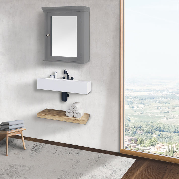 A Gray Teamson Home Removable Mirrored Medicine Cabinet mounted on a wall over a modern white sink next to a large window