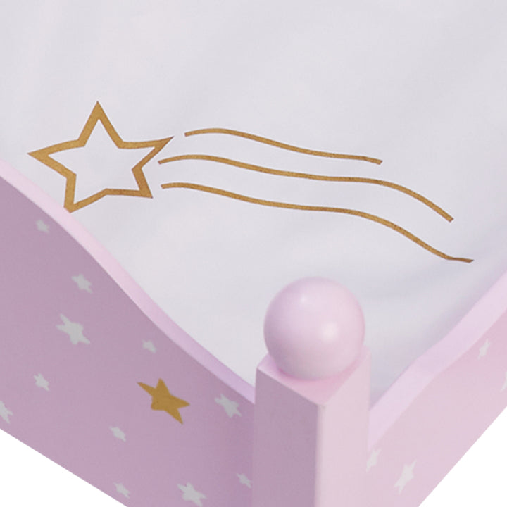 Close-up of the gold star print on white blanket.