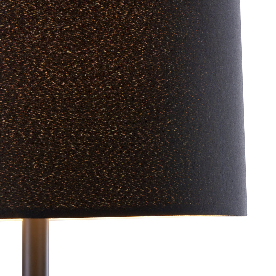 A close-up of a black linen lampshade