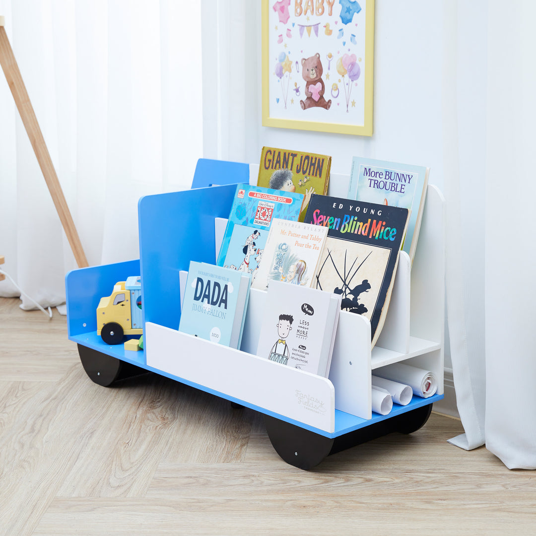 Fantasy Fields  Truck Wooden Display Bookcase, White/Blue, with books placed in the stand-up shelves.