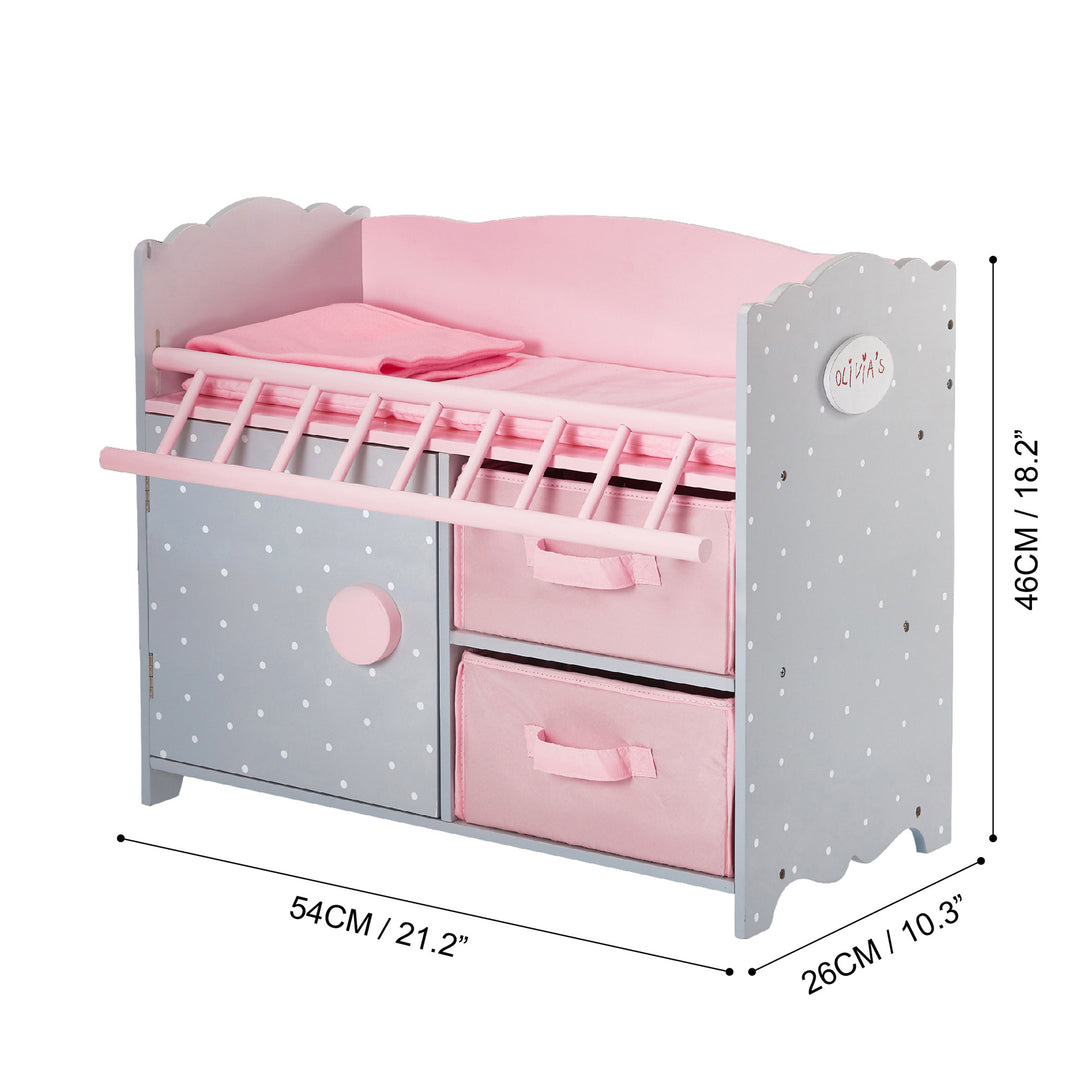 Dimensions in inches and centimeters of a gray baby doll crib with white polka dots and pink accents