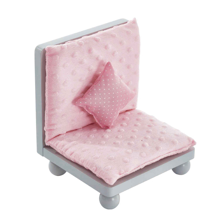 A chair for 18" dolls with a gray finish and pink cushions.