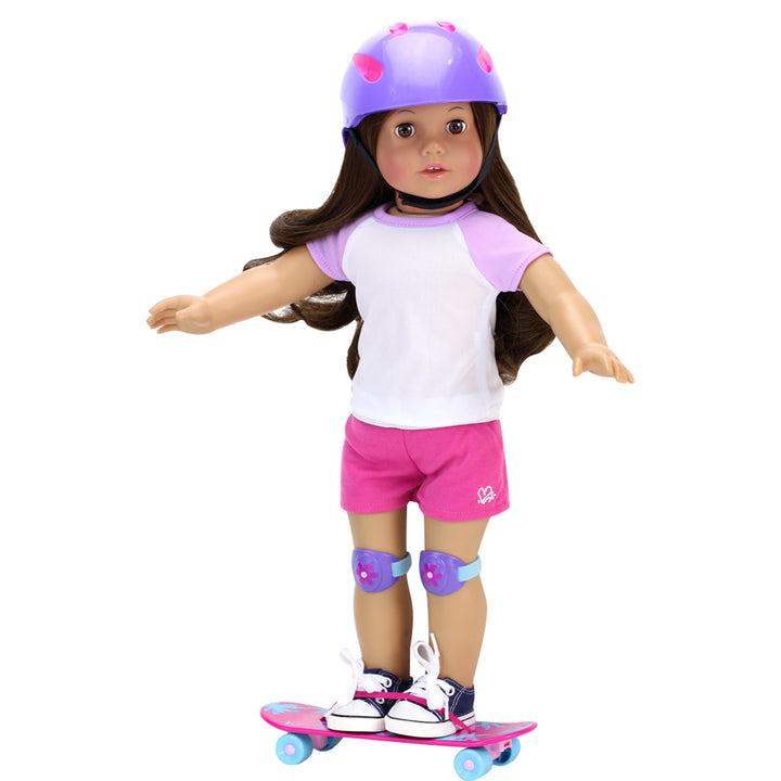 An 18" brunette doll standing on a pink skateboard with her arms out , a purple helmet and knee pads on.