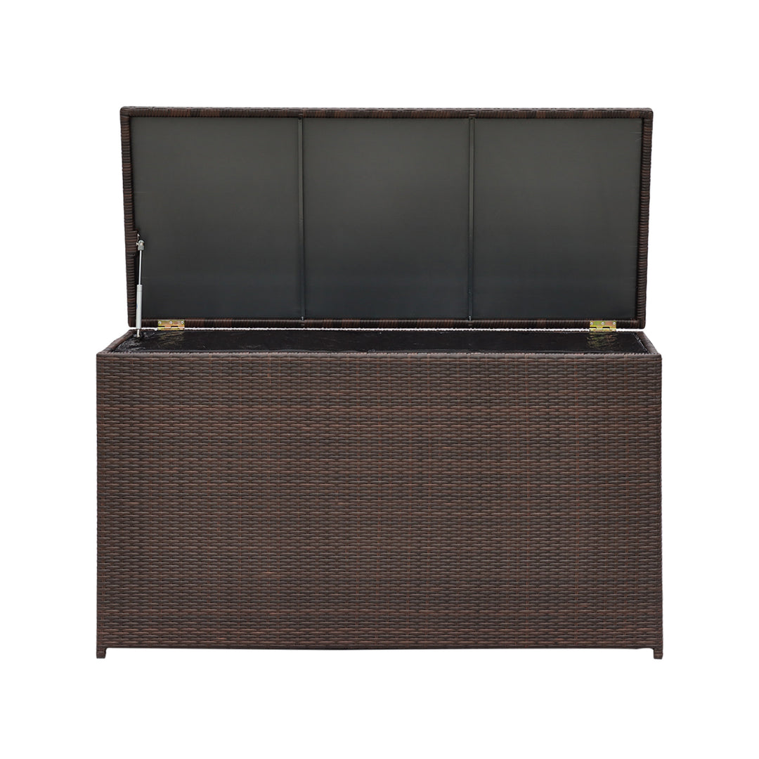 A view of an open Teamson Home Brown PE Rattan 154-Gallon Outdoor Deck Box