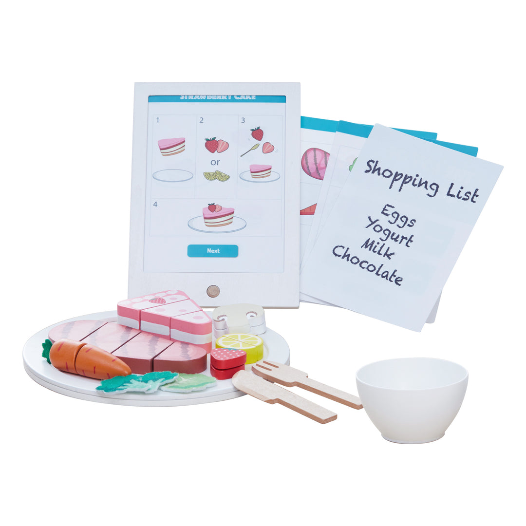 Teamson Kids Little Chef Frankfurt 27 Piece Wooden Play Cooking Set with Recipe Tablet and Ingredients displayed, accompanied by a play shopping list incorporating pretend ingredients for a complete kid-friendly piece design.