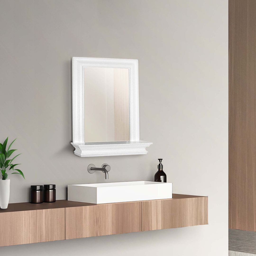 Stratford Wall Mirror in White, hung above a modern sink on a wood grain counter.