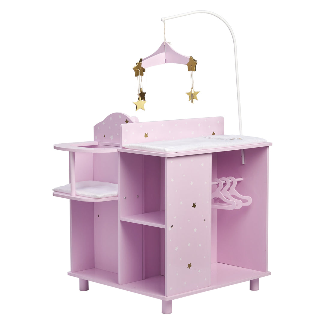 A baby doll changing station in purple with white and gold stars with a view of a closet, storage shelves, mobile and changing table.