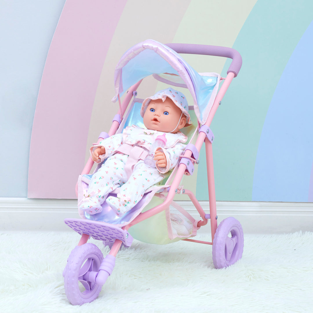 A baby doll sitting in an iridescent baby doll jogging stroller.