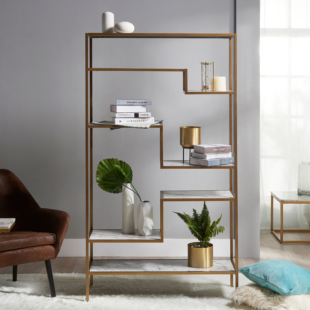 A Teamson Home Marmo Modern Marble 5-Tier Display Shelf, Marble/Brass in a living room.