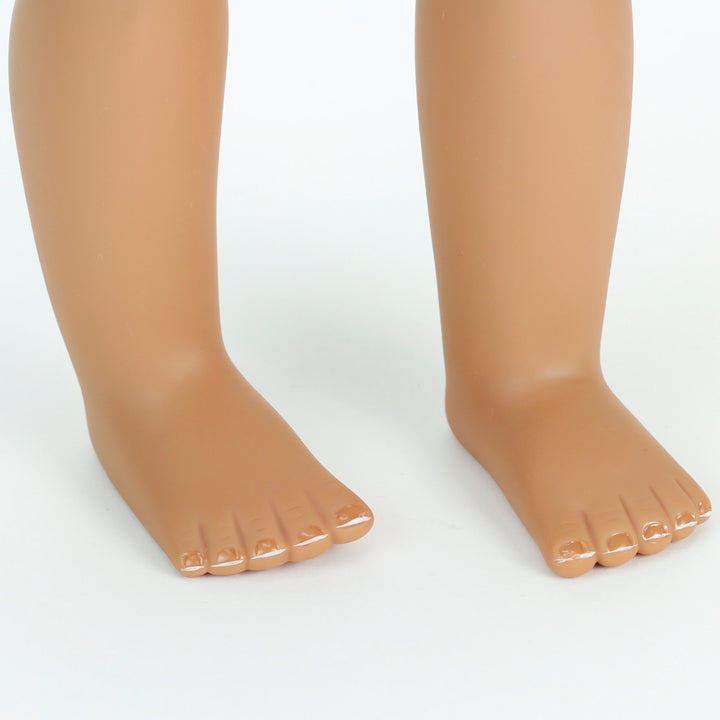 A close-up of the french manicure on the doll's toes.