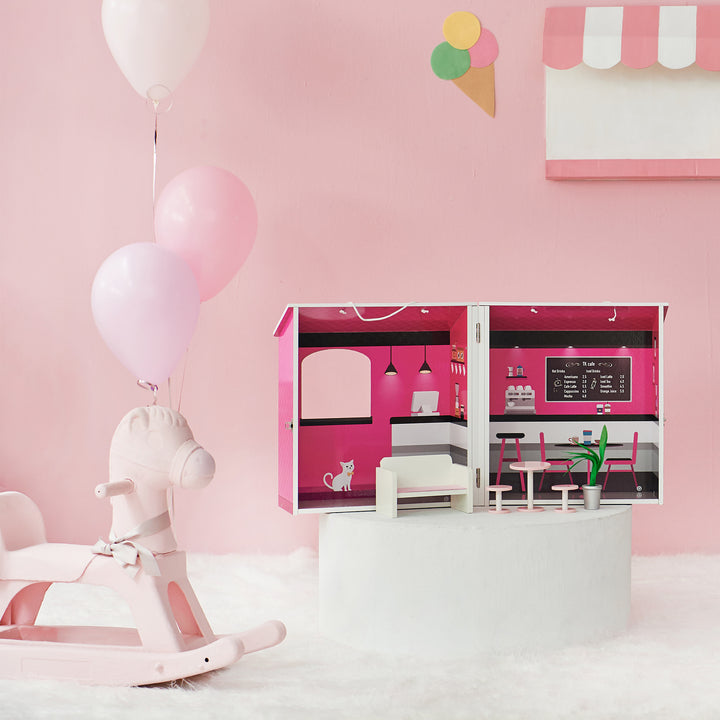 A doll cafe playset open, fully illustrated in hot pink, black, and white with the accessories.