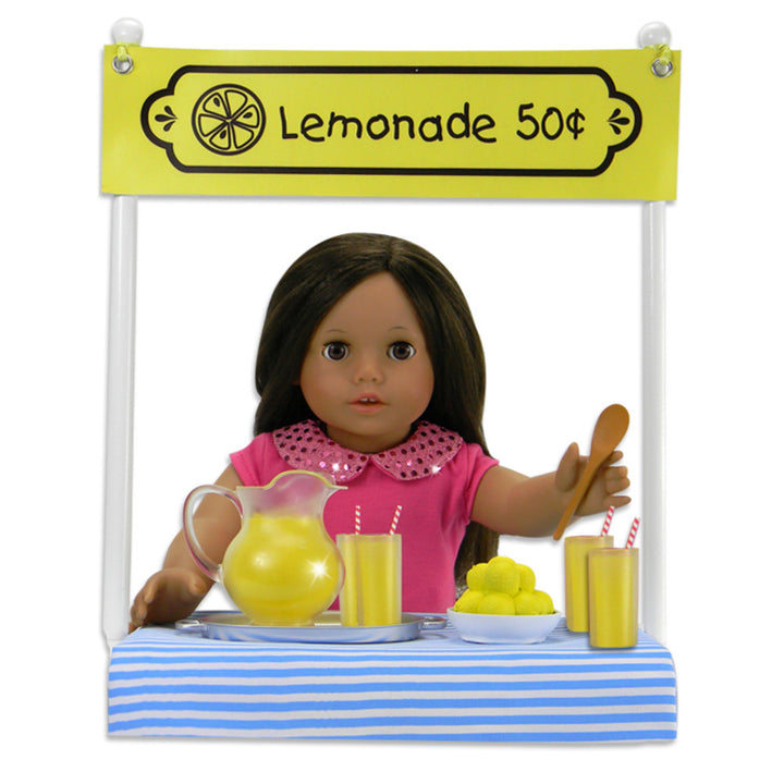 A brunette 18" doll selling lemonade at a lemonade set.