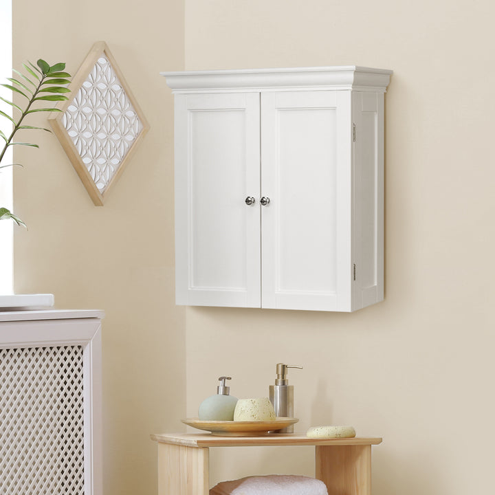 Teamson Home White Stratford Removable Wall Cabinet mounted above a bamboo table with toiletries on top in a yellow room