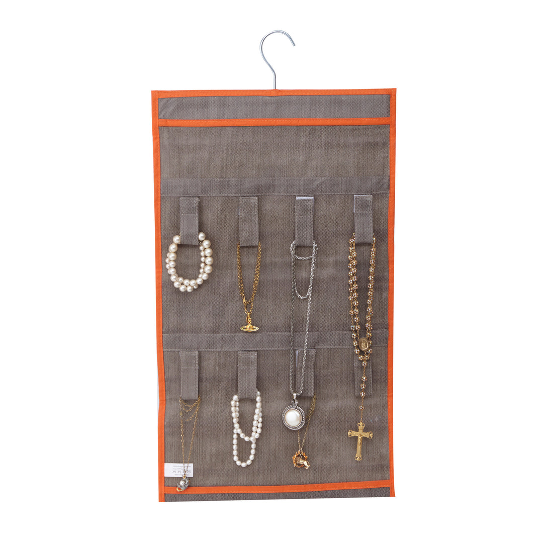 Teamson Home 21-Pocket Hanging Jewelry Organizer, Gray with Orange Trim with necklaces and bracelets hung on hook and loop fixtures