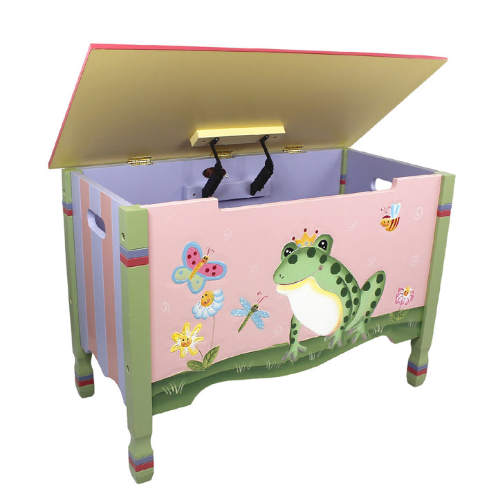 A Fantasy Fields Kids Magic Garden Kids Wooden Toy Storage Chest, Multicolor with a frog on it.