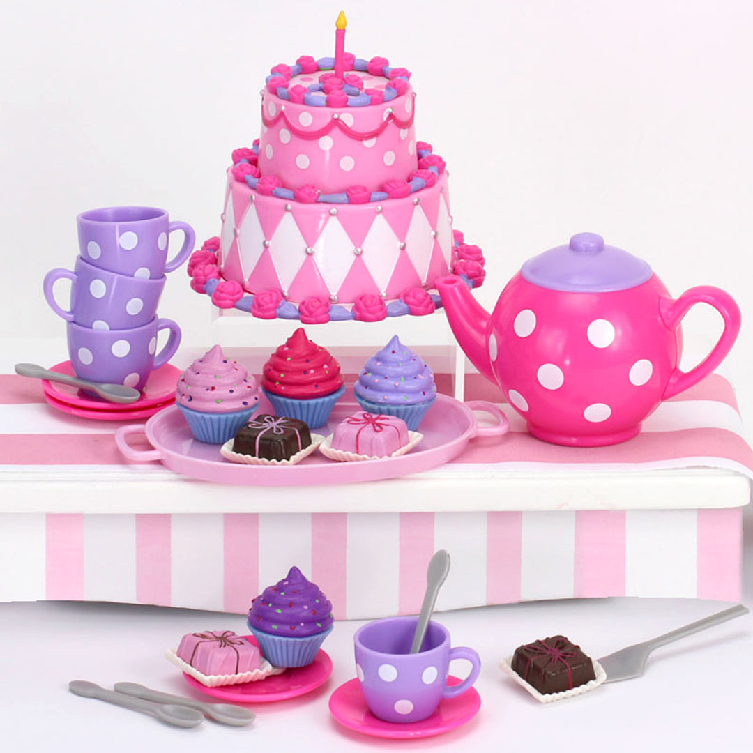 A pink and purple Sophia’s Complete Cake & Tea Party Accessories Set for 18" Dolls.