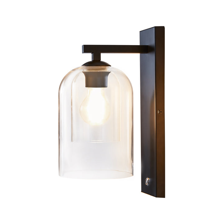 Teamson Home Matte Black Wall Sconce with Double Glass Shade with a button on the bottom of the backplate